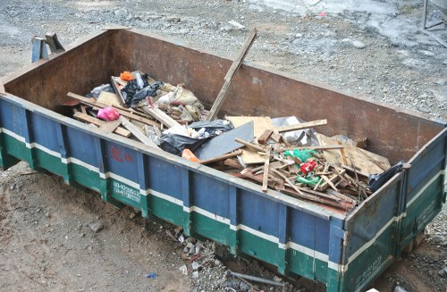 Junk removal team clearing clutter from a residential space