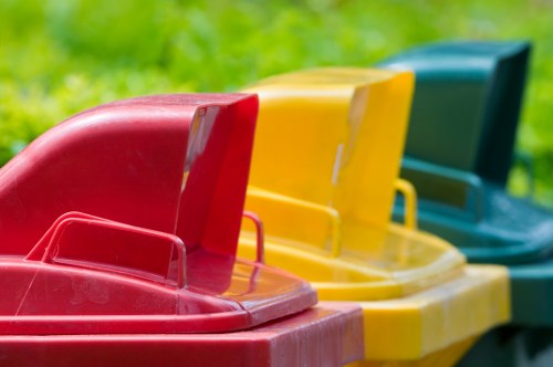 Team handling mixed waste and recyclable materials in a London property