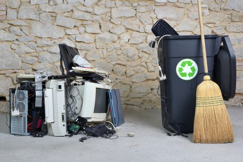 Rubbish removal team handling household waste in London