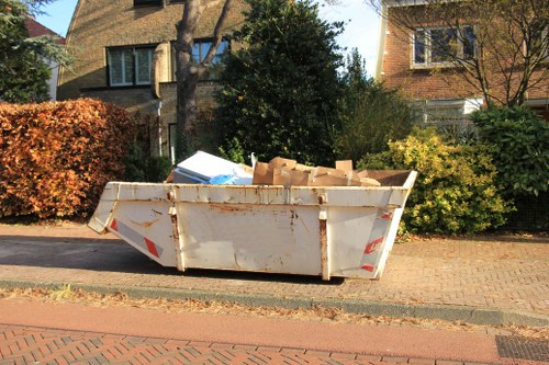 Commercial forecourt and loading bay cleared of litter in London
