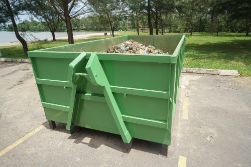 Mixed construction debris ready for collection from a London property